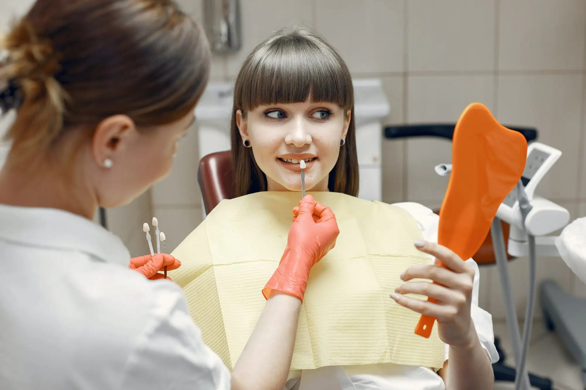 Relaxed patient smiling in the dental chair at Sedation Dental Spa