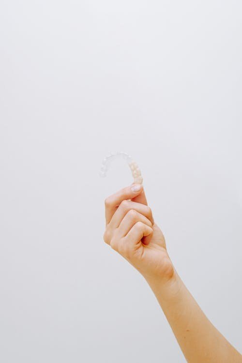 How to remove Invisalign trays easily - Sedation Dental Spa Lighthouse Point FL